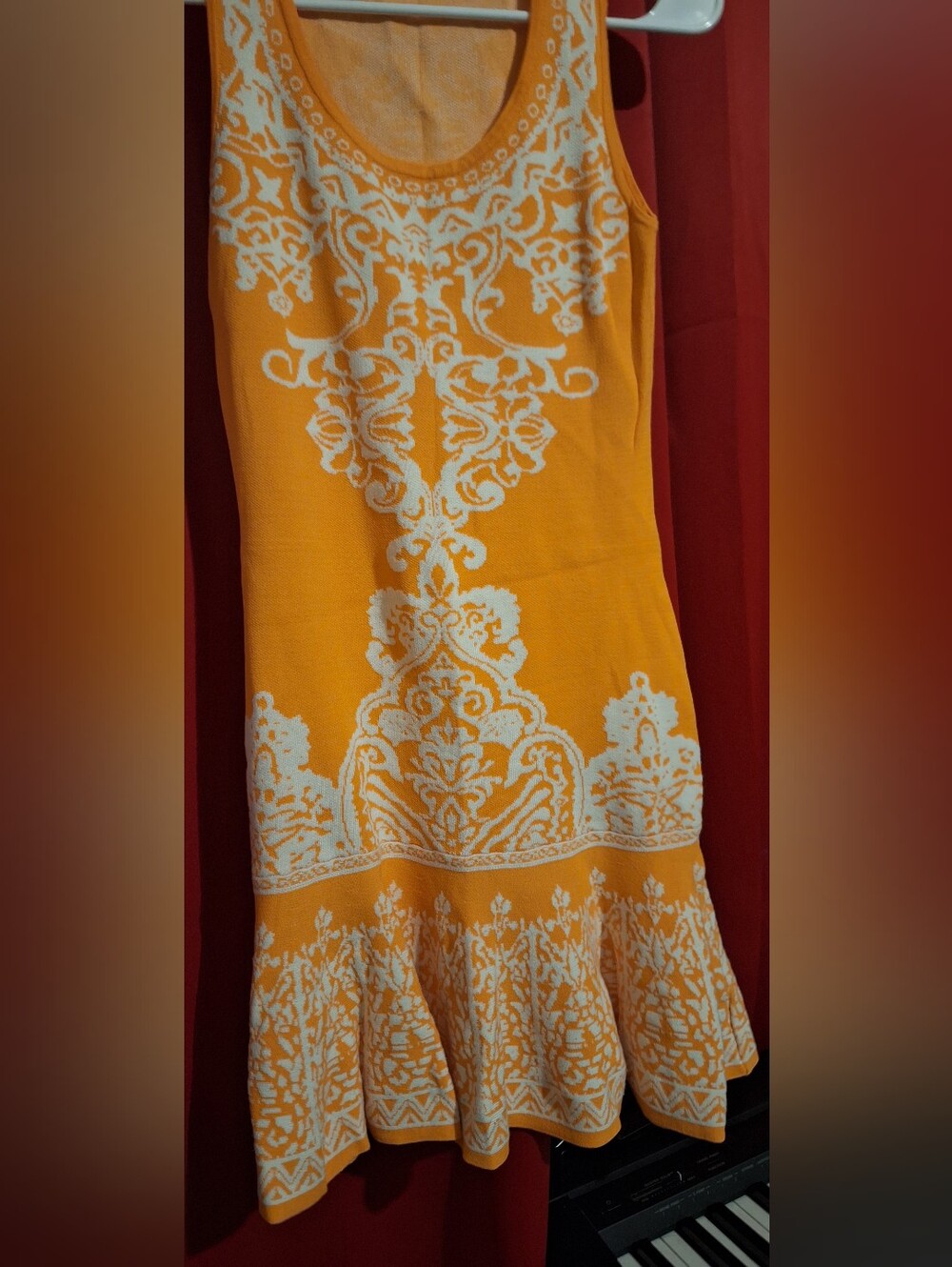 Light Orange Sleeveless Orange & White Patterned Knit Dress